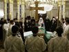 Leading clerics of Russia's Orthodox Church hold a mourning service for Patriarch Alexiy as he is laying in state in his residence in Peredelkino outside Moscow, December 6, 2008. The Russian Orthodox Church chose Metropolitan Kirill as an interim leader on Saturday after the death of Patriarch Alexiy II, a move that could open the way for more cooperation with Catholics. (From Reuters Pictures by REUTERS)