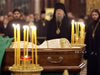 A casket with the late Russian Orthodox Church Patriarch Alexy's body is seen placed for public viewing in Moscow's Christ the Savior Cathedral, Sunday, Dec. 7, 2008. Alexy II, who died Friday at age 79, led the church for 18 years, from the last year of the officially atheistic Soviet Union through a massive revival that saw it become the world's largest Orthodox church. Alexy's body was taken Saturday to the huge Christ the Savior Cathedral for three days of public viewing and a Tuesday funeral. (From AP Photo by Misha Japaridze)