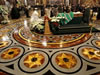 Russian Orthodox church believers approach the casket of the late Patriarch Alexy II, center, placed for public viewing in Moscow's Christ the Savior Cathedral, Sunday, Dec. 7, 2008. Alexy II, who died Friday at age 79, led the church for 18 years, from the last year of the officially atheistic Soviet Union through a massive revival that saw it become the world's largest Orthodox church. Alexy's body was taken Saturday to the huge Christ the Savior Cathedral for three days of public viewing and a Tuesday funeral. (From AP Photo by Misha Japaridze)