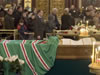 Russian Orthodox church believers pass by a casket of late Patriarch Alexy's body placed for public viewing in Moscow's Christ the Saviour Cathedral December 7, 2008. Russian Orthodox Christians flocked to pay tribute to Patriarch Alexiy II on Sunday as he lay in state in a Moscow cathedral, thanking him for the revival of the faith after decades of communist repression. Alexiy II, enthroned in 1990 a year before the demise of the Soviet Union, died of heart failure on Friday. He was 79. (From Reuters Pictures by REUTERS)