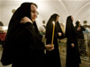 53. Nuns attend a service in honour of the late Orthodox Patriarch Alexiy II in Moscow's Cathedral of Christ the Saviour December 5, 2008. Patriarch Alexiy II, a staunch conservative who revived Russia's Orthodox Church after the collapse of communism and clashed with Rome over Catholic missionary activity, died on Friday at the age of 79. (From Reuters Pictures by REUTERS)