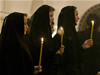 54. Nuns attend a service in honour of the late Orthodox Patriarch Alexiy II in Moscow's Cathedral of Christ the Saviour December 5, 2008. Patriarch Alexiy II, a staunch conservative who revived Russia's Orthodox Church after the collapse of communism and clashed with Rome over Catholic missionary activity, died on Friday at the age of 79. (From Reuters Pictures by REUTERS)