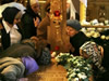 Russian Orthodox believers pay their last respects to Patriarch Alexy II inside the Epiphany Cathedral in Moscow on December 10, 2008. Russia on December 9 buried its first Orthodox patriarch of post-Soviet times in an epic funeral ceremony reflecting the Church's resurgence and close Kremlin ties after the fall of communism. (From Getty Images by AFP/Getty Images)